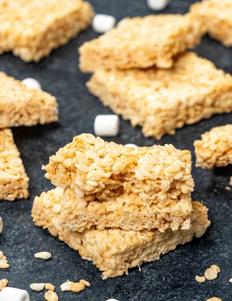 freshly made chewy and delicious rice krispies on a plate.