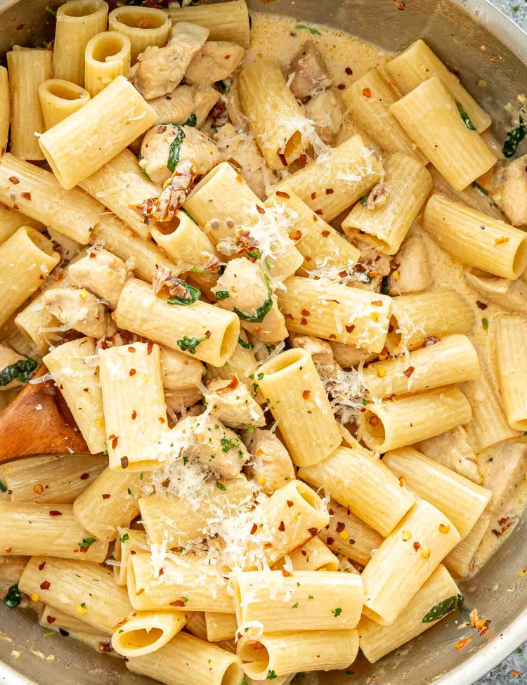 freshly made marry me chicken pasta in a skillet.