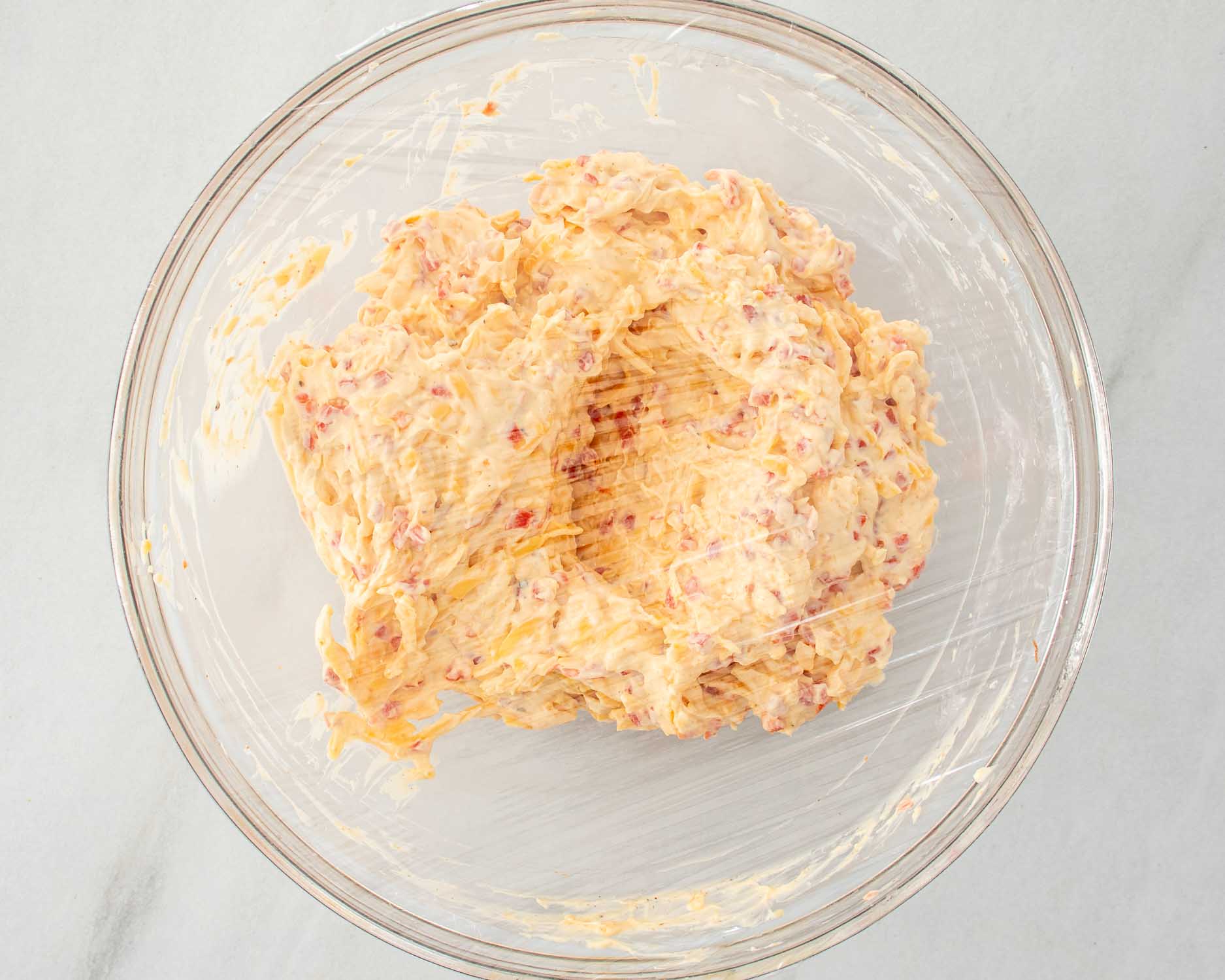 process shots showing how to make pimento cheese.