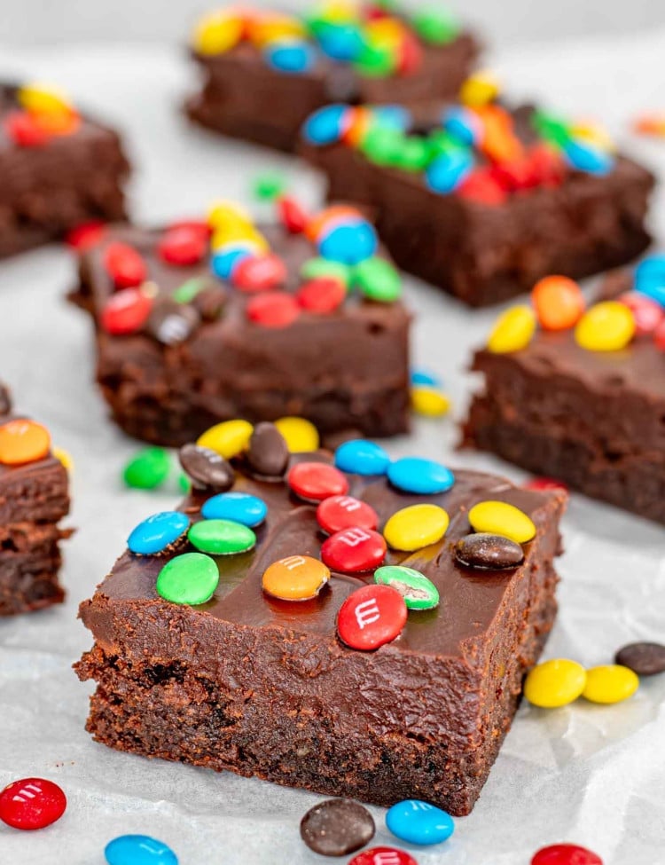 cosmic brownies on a piece of parchment paper.