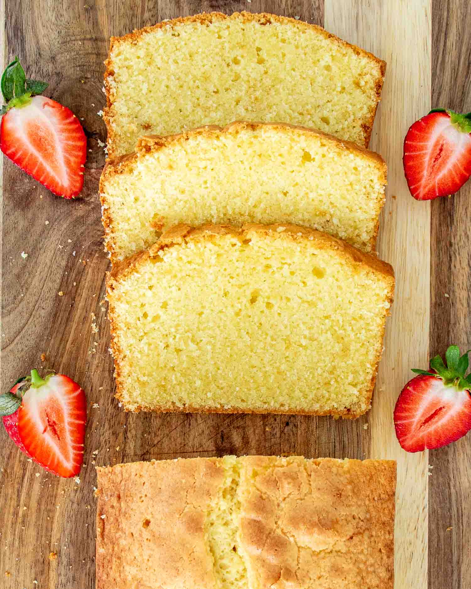sliced butter cake on a cutting board.