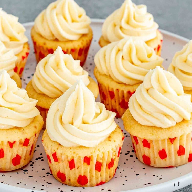 vanilla cupcakes frosted with vanilla frosting.