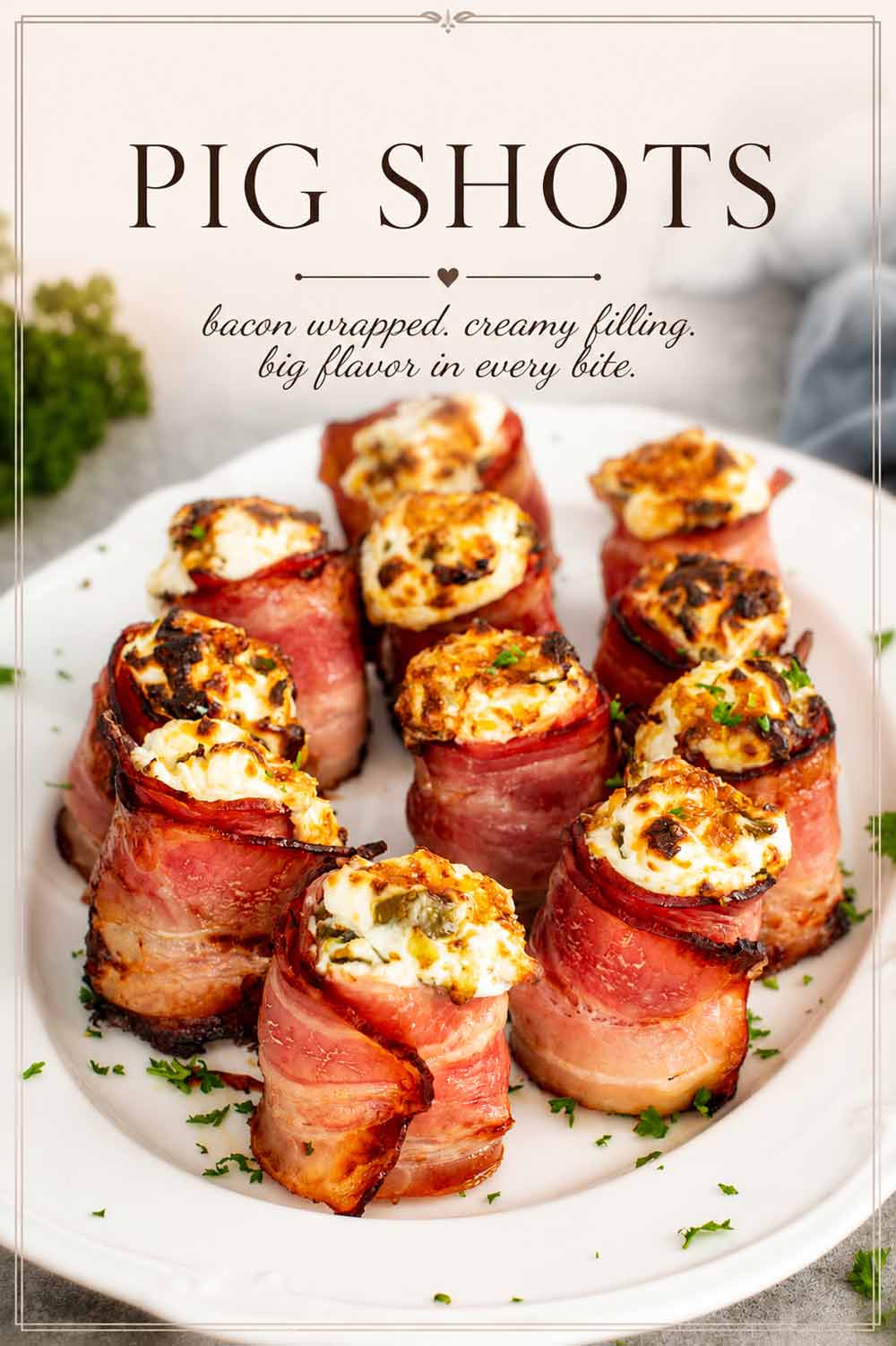 a few pig shots garnished with parsley on a white serving platter.