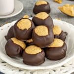 buckeye cookies on a white dessert plate.
