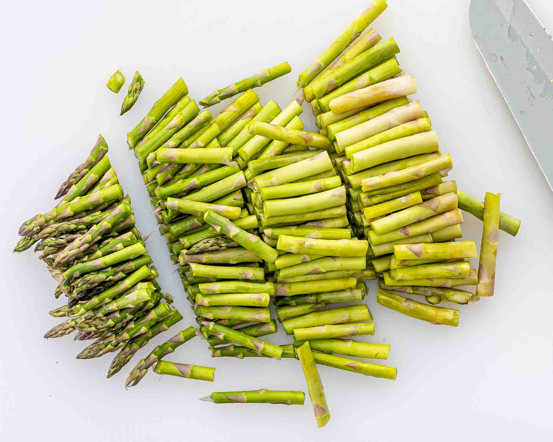 process shots showing how to make asparagus soup.