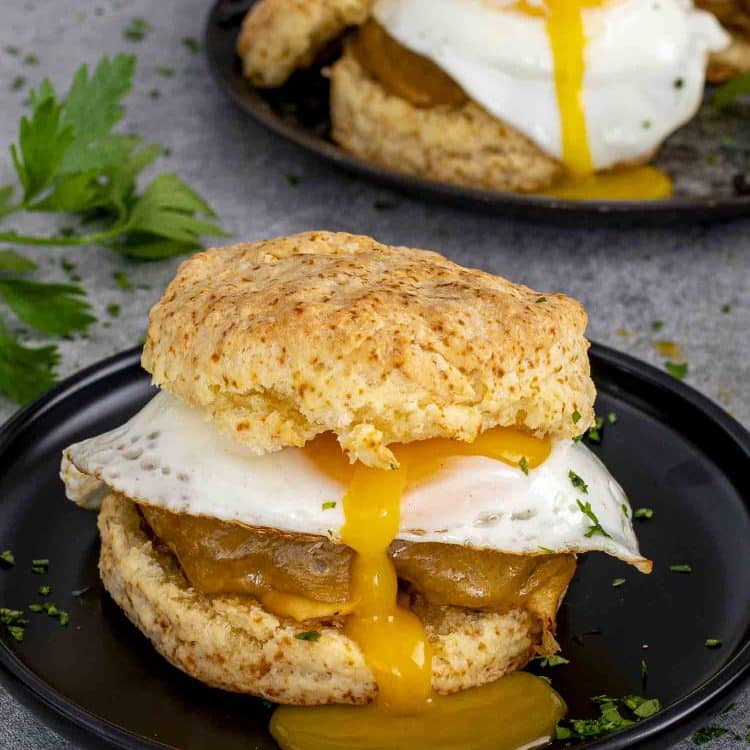 Honey Butter Biscuit Sandwich on a black plate.