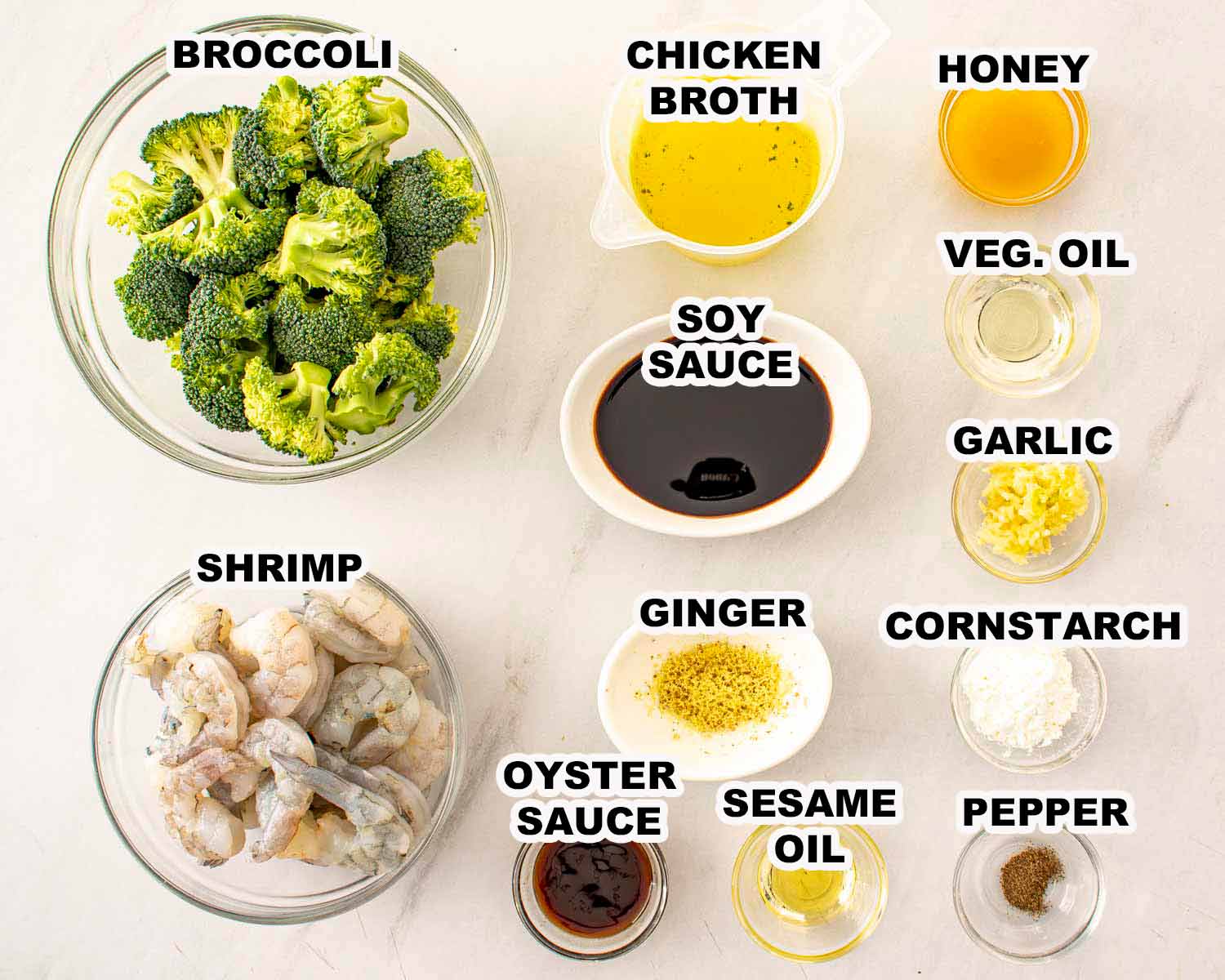 Ingredients for shrimp and broccoli stir-fry including shrimp, broccoli, soy sauce, garlic, ginger, sesame oil, and cornstarch.