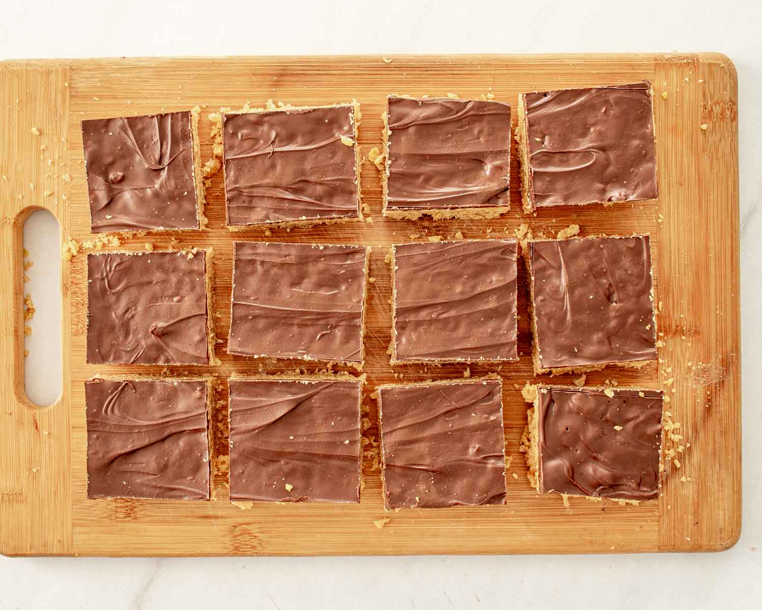 process shots showing how to make butterfinger bars.