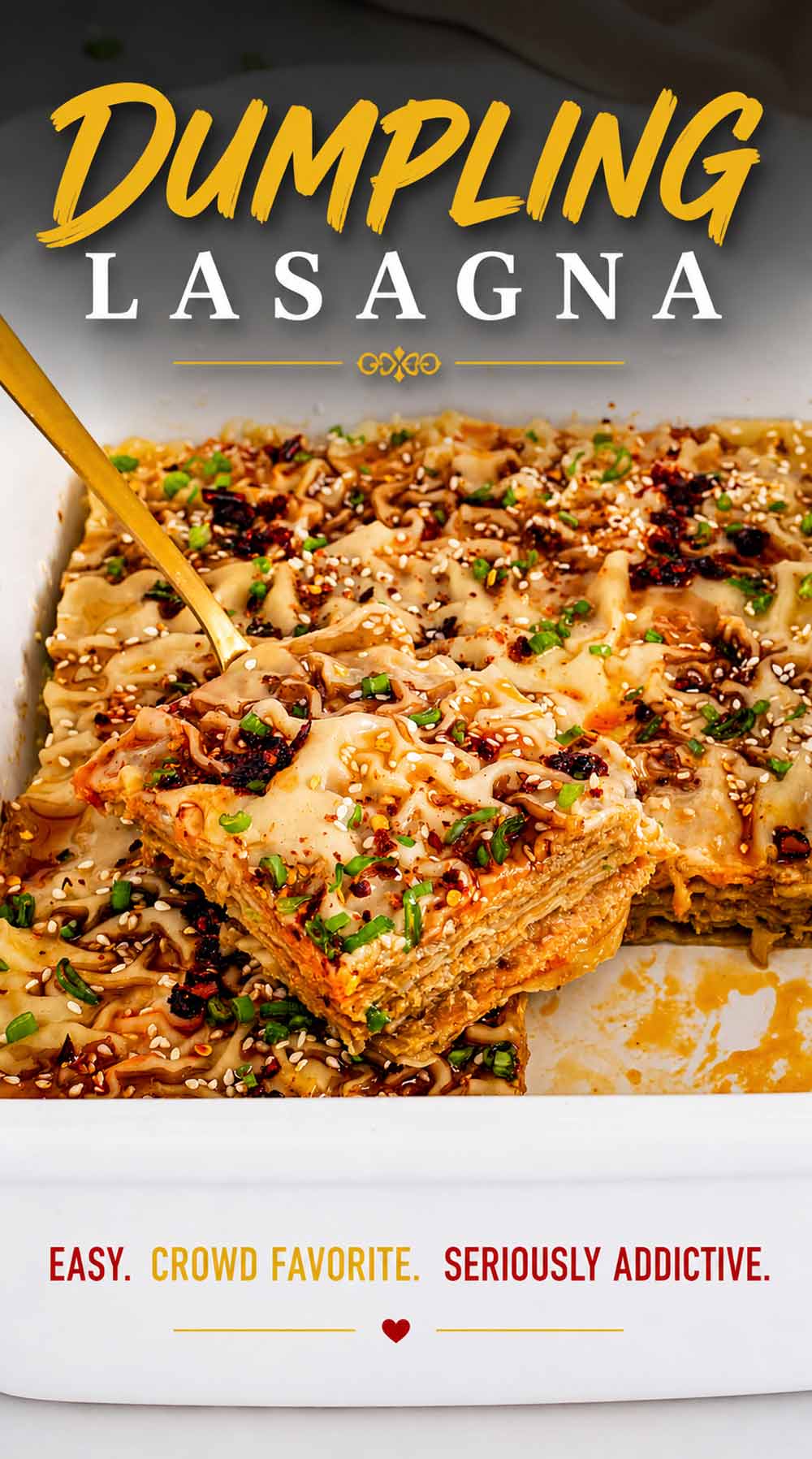 A gold spatula lifting a slice of dumpling lasagna from a white baking dish showing the many savory layers.
