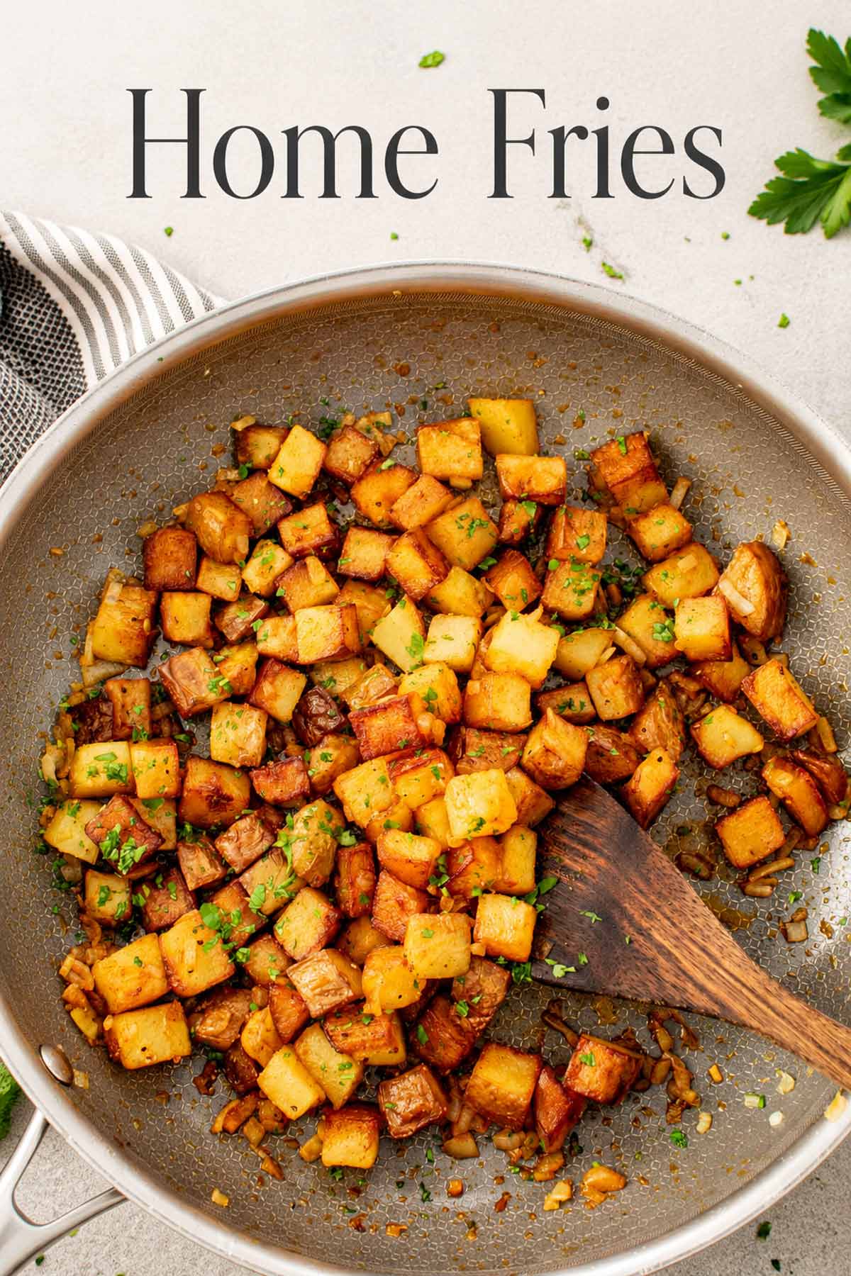 Crispy golden home fries in a skillet with parsley and wooden spatula, styled with elegant minimalist text overlay above.