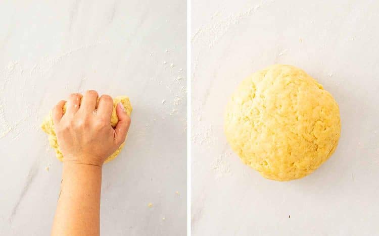 Hands kneading homemade pierogi dough on a floured marble surface then the dough formed into a smooth ball ready to rest.
